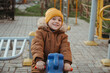 © alexkoral - Happy smiling child boy on the playground in autumn