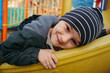 © alexkoral - happy child boy playing on slide on the playground in autumn