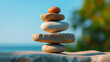 Stacked stones against a blurred background