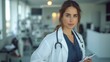 © Adobe Contributor - Portrait of a confident female doctor in a modern hospital