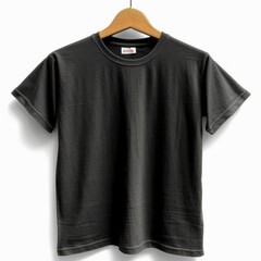 Wall Mural - A black t-shirt on a wooden hanger against a white background