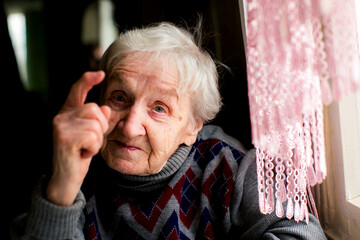 Wall Mural - Portrait of an ironic older woman.