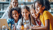 © Rakchanika - Back to school, group of 5 cheerful primary students multiethnic studying in modern science laboratory lab classroom with blackboard background using laptop, children girls enjoy experimenting