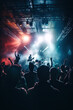 © Kitta - Concert crowd in front of a bright stage lights, music festival