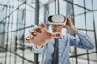 © Katsiaryna - businessman in virtual reality headset in the office
