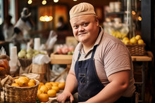 An Adult Male With Down Syndrome Working At A Fruit Shop