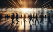 © JQM - Blurred motion of people moving in the lobby of a corporate building, serving as background material for corporate websites