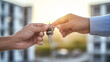 © tonstock - give house keys to the new owner. Real estate concept