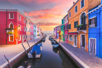 Wall Mural - Burano island canal during sunset, colorful houses and boats, Venice Italy Europe