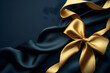 © Pacharee - Luxury golden bow and ribbon on background.