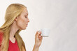 © Voyagerix - Blonde girl with coffee cup