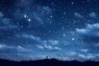 Night sky with stars and silhouette of a man on the mountain
