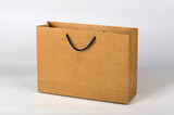 Fototapeta Psy - Cardboard carrier bag, isolated on white