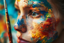 A Close Up Of A Woman With Paint On Her Face