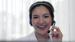 © Summit Art Creations - Businesswoman wearing vivancy headset working in office to support remote customer or colleague. Call center, telemarketing, customer support agent provide service on telephone video conference call