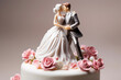 Figurines of the bride and groom on a wedding cake. Close-up of wedding cake topper. Traditional wedding sweets and decorations.