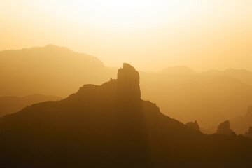 Wall Mural - Silhouette of the Roque Nublo mountain at sunset, Gran Canary, Spain