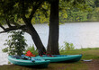 Summertime Kayaking boats on Shore