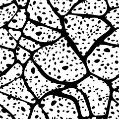 Seamless pattern with dotted stones - hand drawn black and white vector illustration.