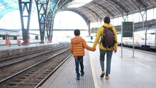 Mother With Son, Single Mother Walking Through The Park, Barcelona Train Station, Visiting The City, Travel Concept, Single Parent Mother With Son, Adventure Of Discovering The City And The World