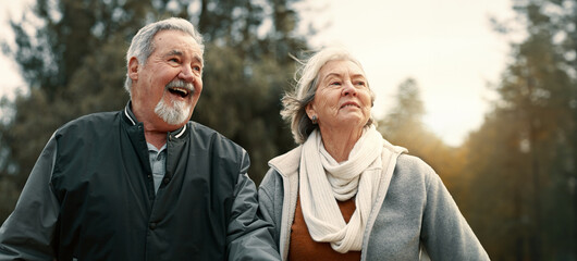 Love, smile and a senior couple walking outdoor in a park together for a romantic date during retirement. Happy, care or excited with an elderly man and woman bonding in a garden for romance