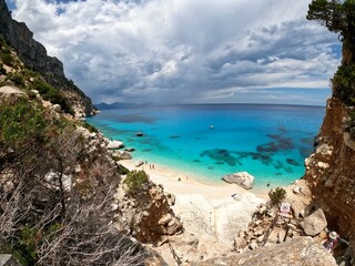 Wall Mural - Sardinia Beach sand cloudy sky