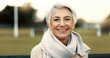 © Clement C/peopleimages.com - Face, elderly woman and happy on park bench on vacation, holiday or travel in winter. Portrait, smile and senior person in nature, outdoor or garden for freedom to relax for retirement in Australia
