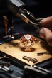 © Fotograf - A person is seen working on a diamond. This image can be used in various contexts