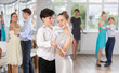 © JackF - Boy and girl dance couples ballroom dance waltz in studio