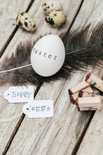 Rustic Easter Eggs And Decorations On Wooden Background