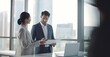 © Stock Pix - Personal assistant briefing in a modern office with cityscape view.'