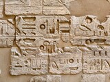 egyptian bas relief with hieroglyphs