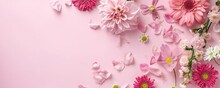 Pink Flowers On A Wooden Background