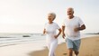 © Stavros - Jogging workout. Middle aged couple during jogging workout on the beach