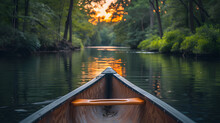 A Canoe On A Tranquil River, With Lush Forests On Either Side As The Background, During A Peaceful Summer Evening