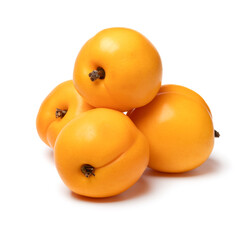 Wall Mural - Heap of fresh ripe healthy nectarcot fruit close up isolated on white background