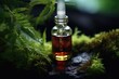 A bottle of essential oil sitting on a mossy surface. Perfect for aromatherapy and natural wellness. Use this image to promote relaxation, self-care, and the benefits of essential oils