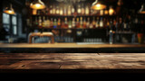 Fototapeta Londyn - Old wooden table in dark blurred bar