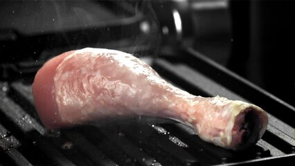 Sticker - Chicken legs are fried in a pan. Filmed on a high-speed camera at 1000 fps. High quality FullHD footage