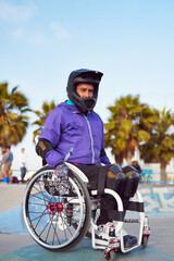 Wall Mural - portrait athlete male with disability in wheelchair at skatepark	