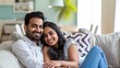 © Jiraphiphat - Celebrating Parenthood, Happy Indian Couple Embracing at Home