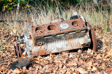 old rusty broken car engine in Chernobyl