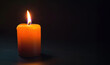 © BraveSpirit - Lighted candle isolated on black
