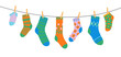 Cotton and wool socks on clothesline, socks on rope with clothespins. Cartoon vector hosiery hang side by side on laundry line. Colorful pairs for kids and adults convey warmth, freshness and texture