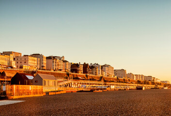 brighton, east sussex, uk - hotels on the seafront at brighton, from the beach during winter sunrise