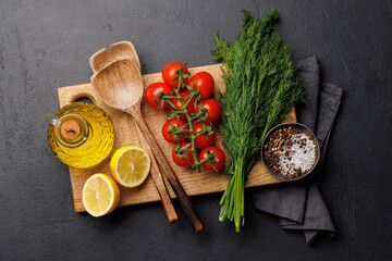 Poster - Cooking scene: Cherry tomatoes, herbs and spices on table