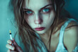 © J S - Close-up portrait face view of a drug addict girl holding an injection needle in hand