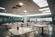 Empty white chair and table in cafeteria of shopping mall Air duct air conditioner pipe and fire spr