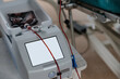 Blood bag placed on medical device during process on blood transfusion in hospital