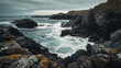 A rugged coastline with crashing waves and jagged cliffs.